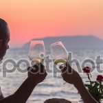 pghead_sunset-couple-white-wine-together